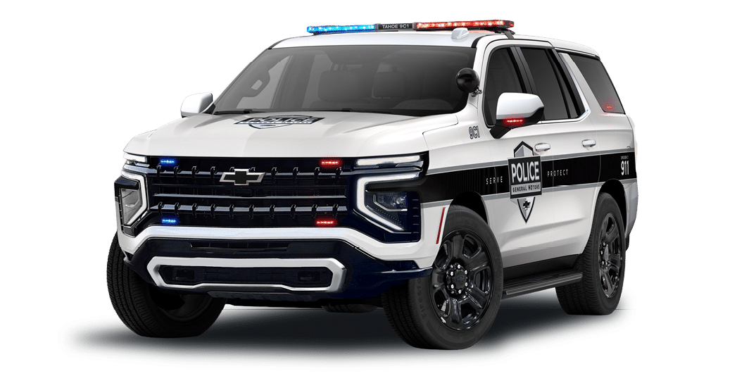 A white police vehicle with blue lights on top. Description generated by AI