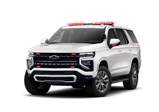 A white Chevy truck with red lights on the front. Description generated by AI